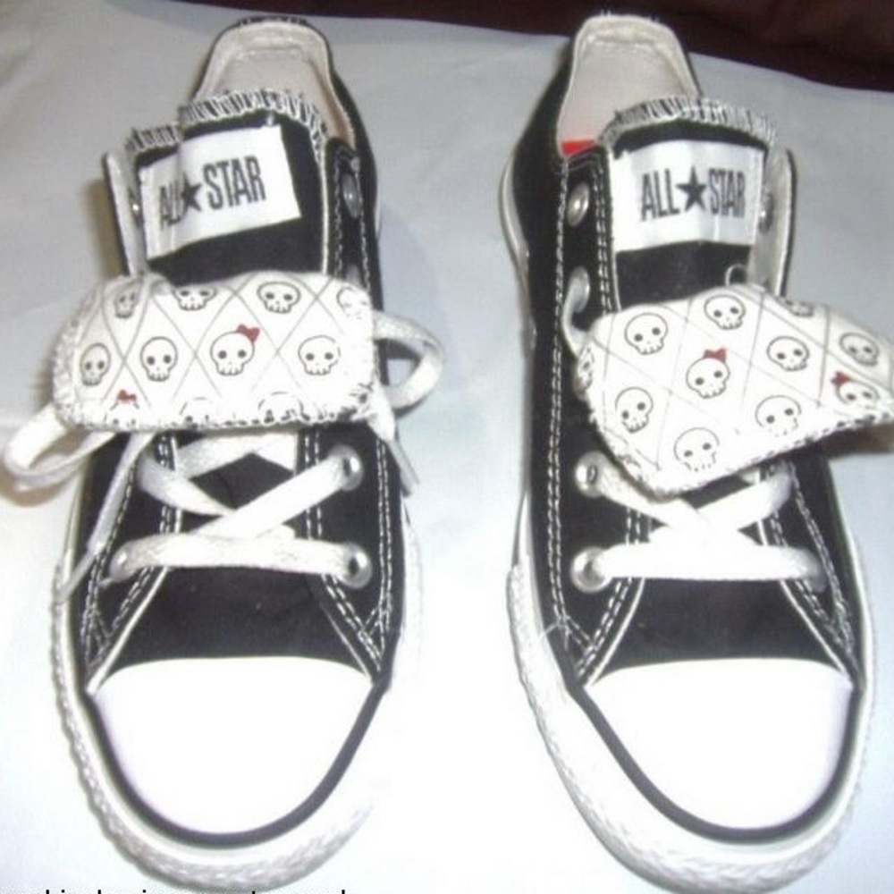 Converse Chuck Taylor Double Tongue Low sneakers.